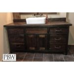 Rustic vanity hand crafted from reclaimed barnwood