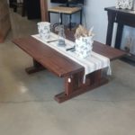 Rustic cabin coffee table designed with a pedestal base locally made using solid wood