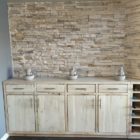 Modern design buffet hand made from localled sourced reclaimed barnwood finished off with modern hardware