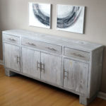 Modern design buffet hand made from localled sourced reclaimed barnwood finished off with modern hardware