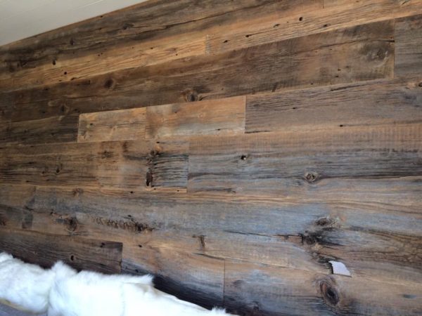 Reclaimed brown weathered wood accent wall